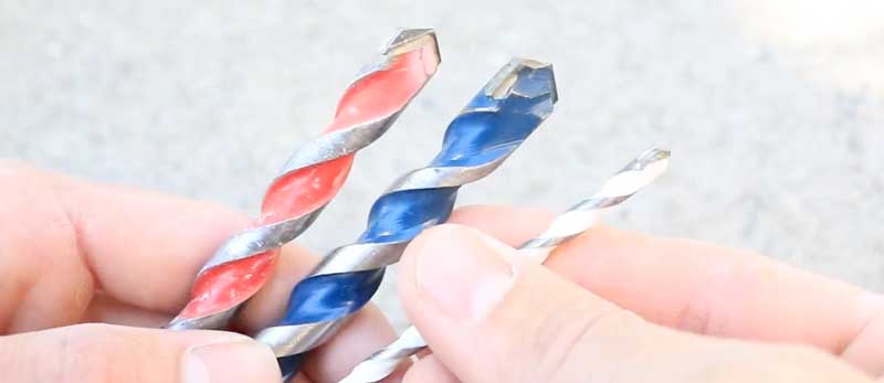 Masonry drill bits for concrete