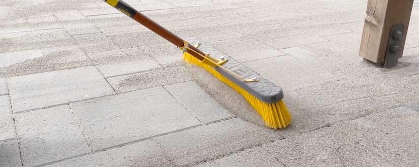 sweep in jointing sand to pavers