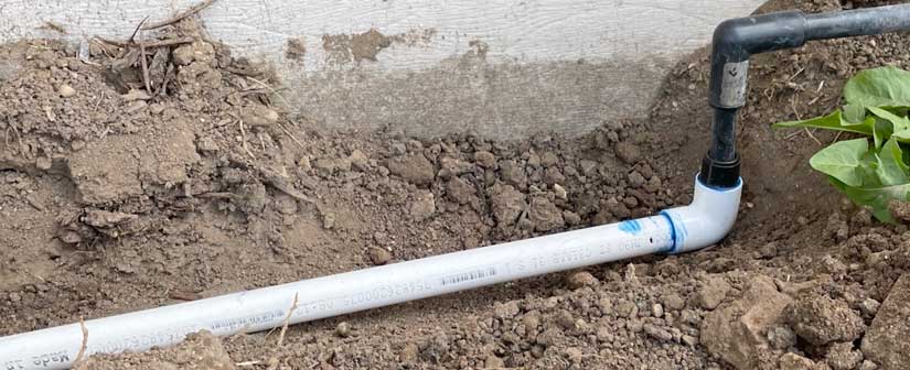 sprinkler line under patio