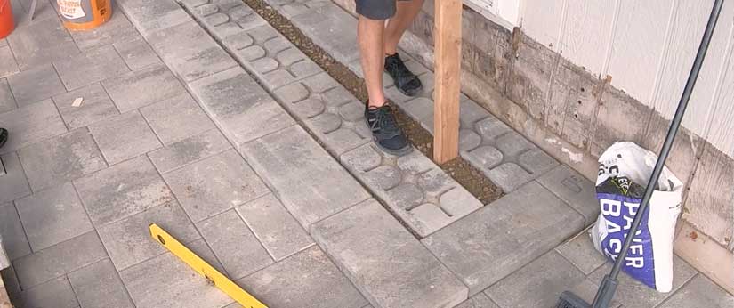 Paver base between concrete blocks