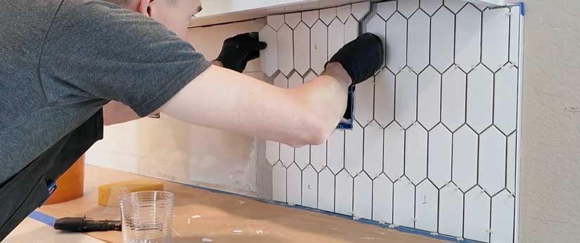 Applying backsplash tile with spacers