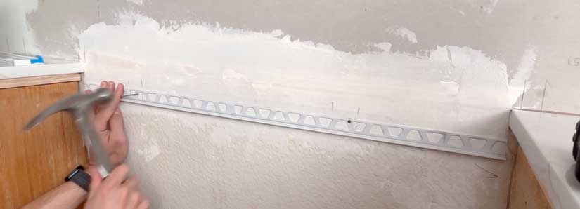 Ledger board behind stove